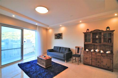 Χώρος καθιστικού στο Superior Xlendi Lungomare Apartment
