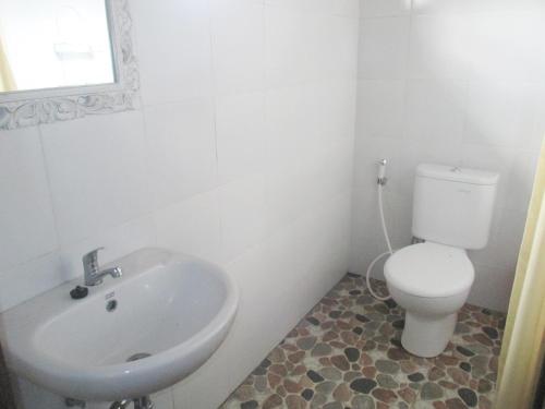 Ένα μπάνιο στο Green Paddy Hostel & Villa