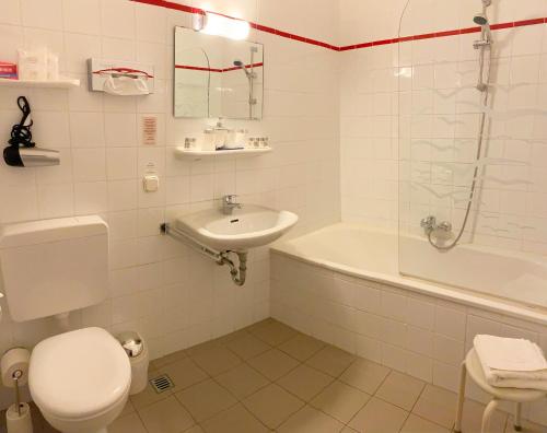Koupelna v ubytování Altstadthotel Augsburg
