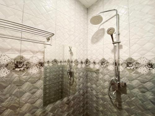 Ένα μπάνιο στο J Boutique Hotel 新张优惠