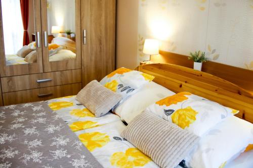 Ένα ή περισσότερα κρεβάτια σε δωμάτιο στο Dia Apartman