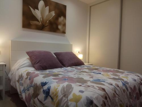 Postel nebo postele na pokoji v ubytování Esplendido APARTAMENTO, CARIHUELA EDIFICIO EL REMO, PRIMERA LÍNEA