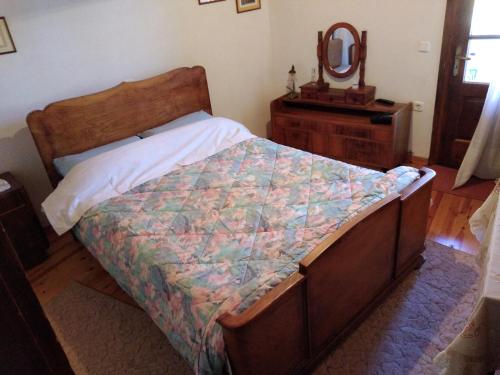 Postel nebo postele na pokoji v ubytování Balkone in Montagna (Μπαλκόνι στο Βουνό )