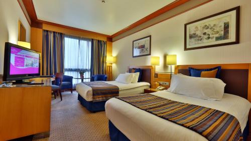 Μια τηλεόραση ή/και κέντρο ψυχαγωγίας στο Crowne Plaza Hamra Beirut by IHG