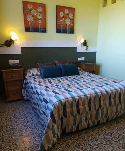 Ένα ή περισσότερα κρεβάτια σε δωμάτιο στο Hotel Sierra de Araceli Lucena