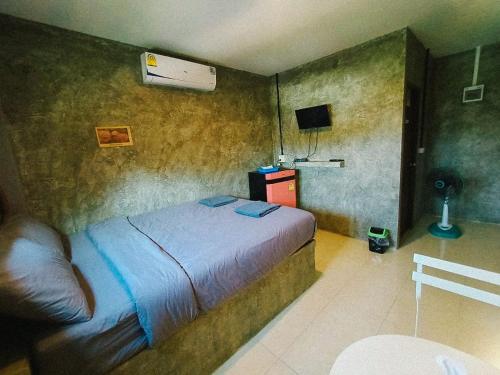 Postel nebo postele na pokoji v ubytování Chill loft โฮมเสตย์