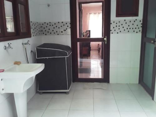 Et badeværelse på Casa Premium Entre o Verde e o Mar