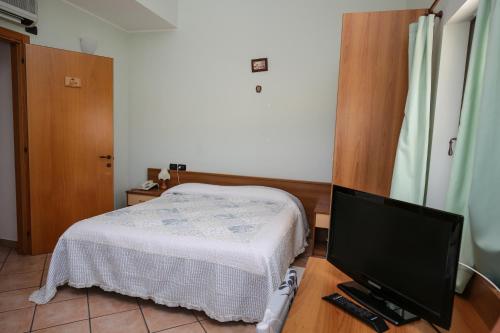 TV a/nebo společenská místnost v ubytování Al Casolare