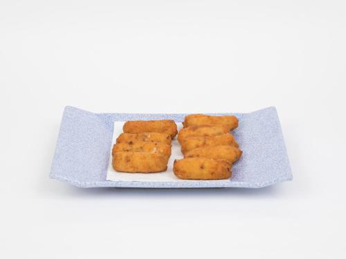 a tray of fried food on a white plate at Hotel Roma in Sarria