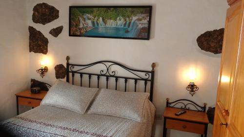 Voodi või voodid majutusasutuse Casa Rural El Valle toas