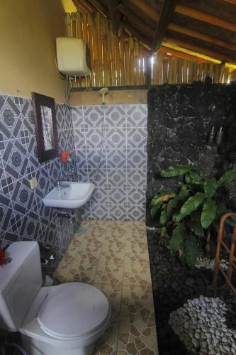 Kúpeľňa v ubytovaní Giri Carik