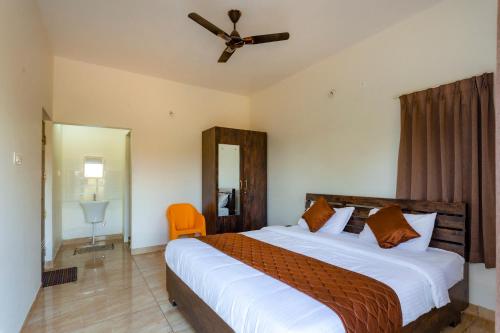 Ένα ή περισσότερα κρεβάτια σε δωμάτιο στο Orchid Elite Service apartments