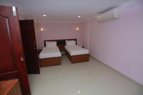 Ein Bett oder Betten in einem Zimmer der Unterkunft Luxora Hotel and Spa