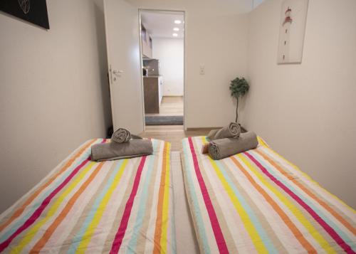 Una cama o camas en una habitación de Modern Old Town Apartment