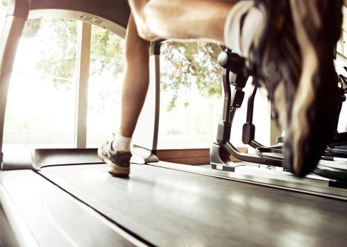 a person running on a treadmill with a horse at Crowne Plaza Hong Kong Causeway Bay by IHG in Hong Kong