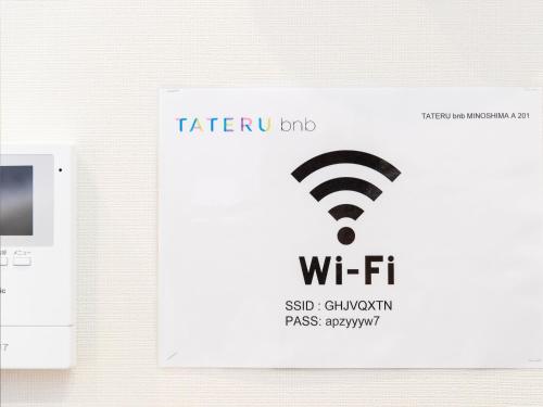 a picture of a wifi sign on a wall at TRIP POD MINOSHIMA A in Fukuoka