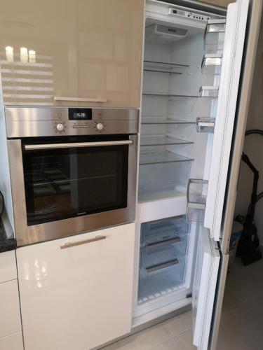 ครัวหรือมุมครัวของ Apartman Gaga 1