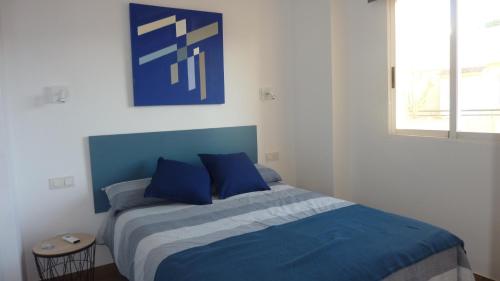 Ліжко або ліжка в номері Guesthouse en Coveta fumà- El Campello