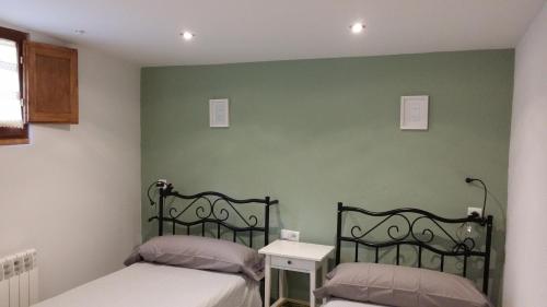 Ένα ή περισσότερα κρεβάτια σε δωμάτιο στο CAL GERARD - ARCAVELL