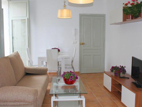 a living room with a couch and a table at Apartment Bella by Interhome in Altea