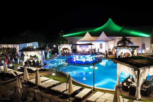 Skats uz peldbaseinu naktsmītnē Hotel Magic GT Trivale vai tās tuvumā