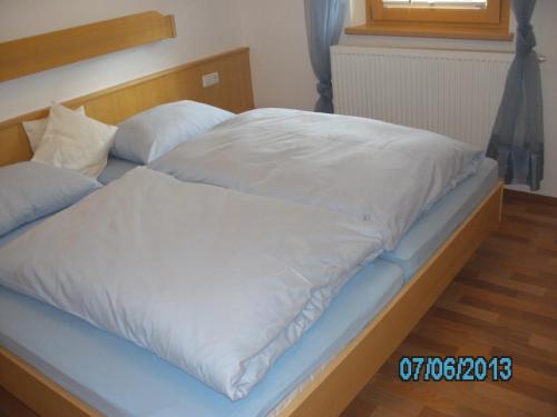 Un ou plusieurs lits dans un hébergement de l'établissement Haus Znopp