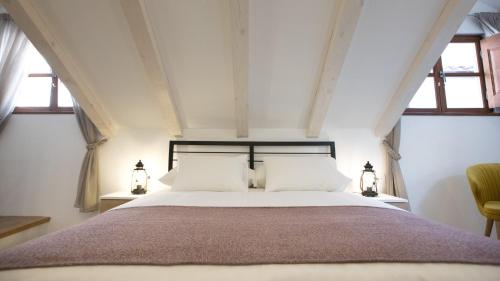 Postel nebo postele na pokoji v ubytování Villa Four Winds IV