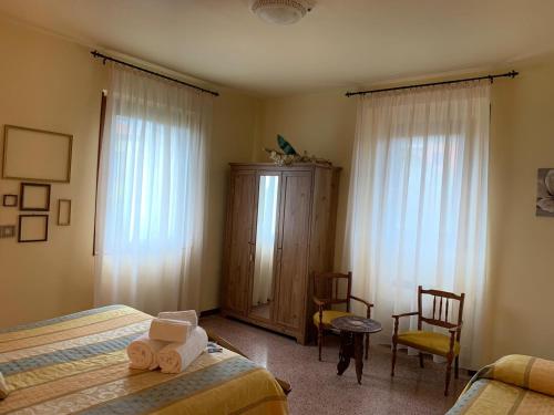 Ένα ή περισσότερα κρεβάτια σε δωμάτιο στο Bed & Breakfast Mafi