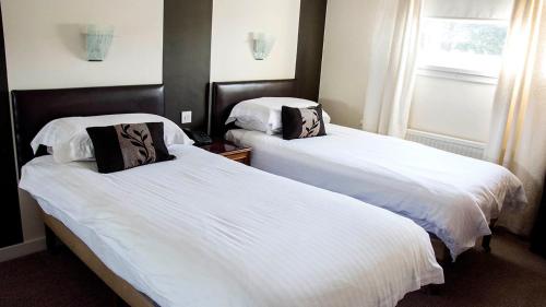 Cama o camas de una habitación en Avonbridge Hotel