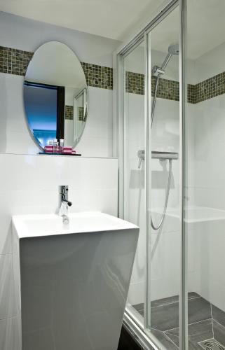 Koupelna v ubytování Hotel Antin Trinité