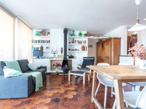 a living room with a couch and a table at Apartment Ursula by Interhome in Torredembarra