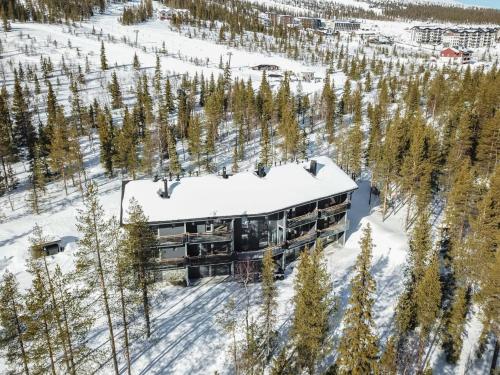 an aerial view of a building in the snow at Holiday Home Ylälänsi 3 as 5 by Interhome in Ylläsjärvi