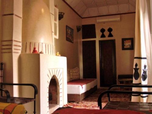 Postel nebo postele na pokoji v ubytování Nadir Home