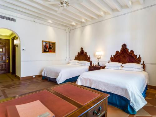 Katil atau katil-katil dalam bilik di Hotel Solar de las Animas