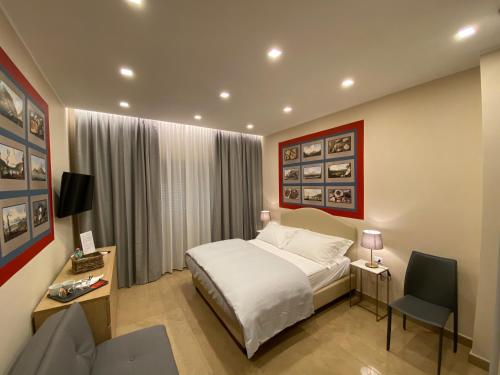 Voodi või voodid majutusasutuse MDC LUXURY ROOMS NAPLES toas