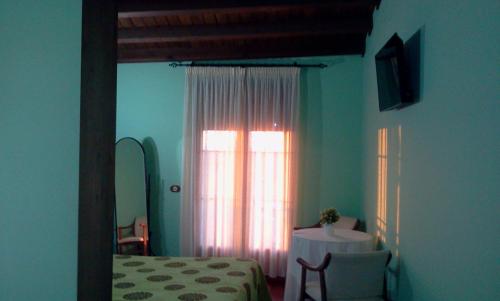 A bed or beds in a room at El Rincon Del Villar