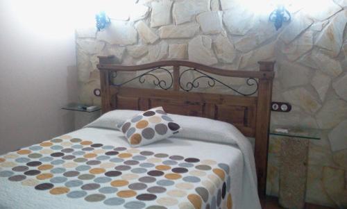 A bed or beds in a room at El Rincon Del Villar