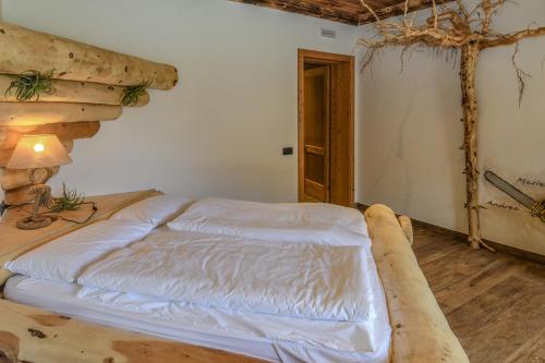 Agritur LA DASAにあるベッド