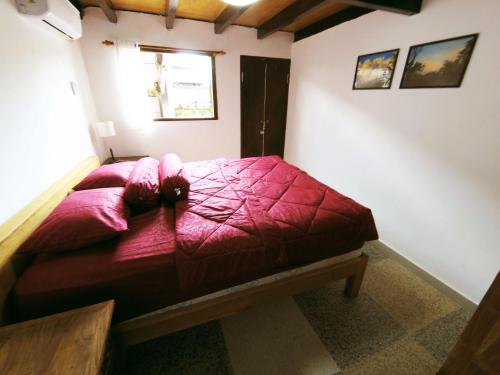 Postel nebo postele na pokoji v ubytování Capung Guesthouse