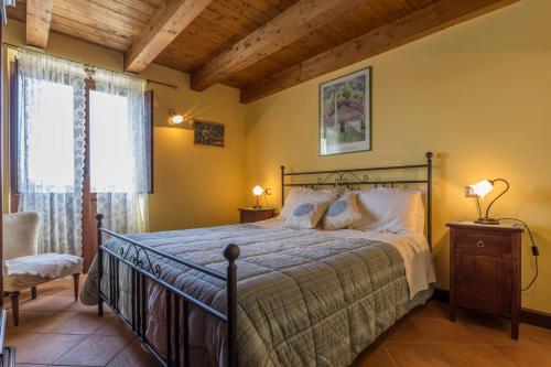 Giường trong phòng chung tại Residence Villa Valsi