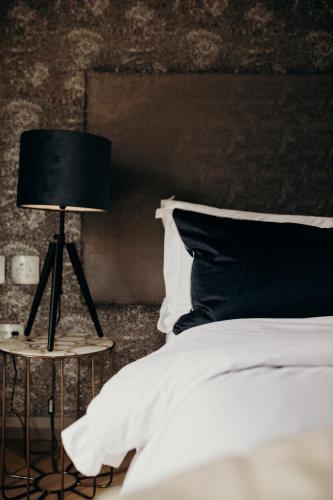 Letto o letti in una camera di Franschhoek Boutique Hotel - Lion Roars Hotels & Lodges