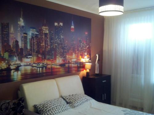 Postel nebo postele na pokoji v ubytování Квартира у метро Студенческая, Фармакадемия, Караван