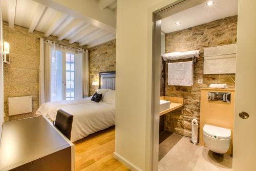Ванная комната в Hotel Montenegro Compostela