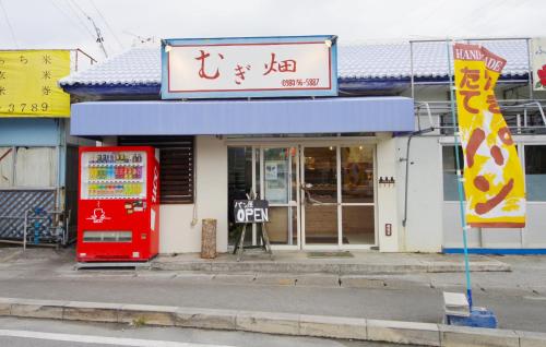 Fotografie z fotogalerie ubytování フクギに囲まれた家 さばんぎ沖縄古民家 SAVANGI Okinawan Designed Folk House v destinaci Nakijin