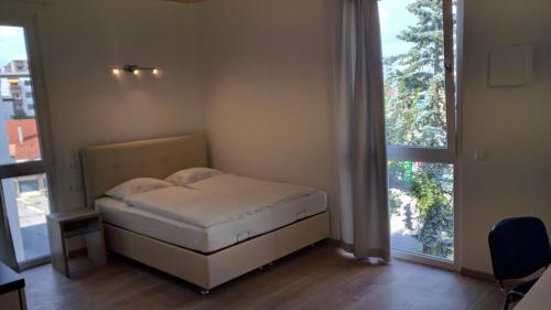 Ліжко або ліжка в номері 212 St Petersburg, Studio Apartment, 27m2, 1-2 Pers