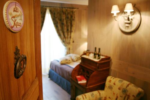 Katil atau katil-katil dalam bilik di Hotel Letterario Locanda Collomb