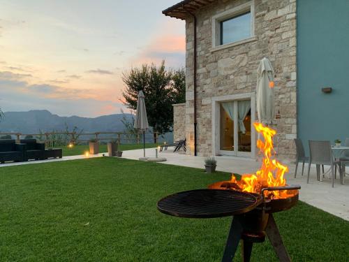 a fire pit in the backyard of a house at Residenza Case Pacifici in Ascoli Piceno