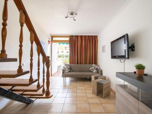 Televízia a/alebo spoločenská miestnosť v ubytovaní Holiday Home Maspalomas near Beach & Golf