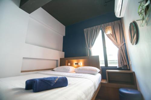Homy Seafront Hostelにあるベッド