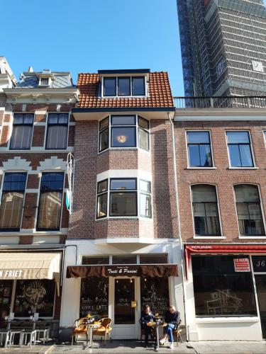
a building with a large window on the side of it at Boutique Hotel Frada in Utrecht

